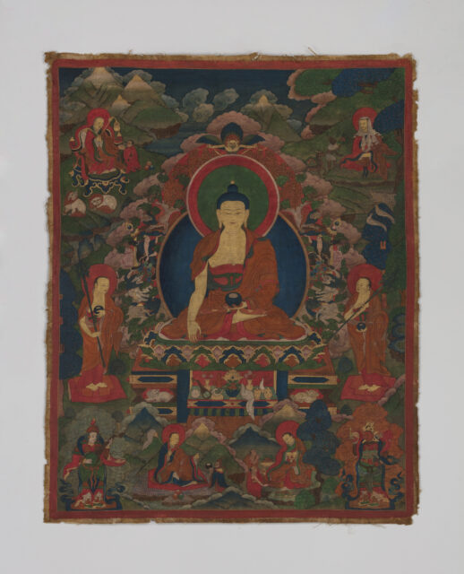 Painting on cloth depicting Buddha seated on lotus pedestal, surrounded by attendants, before mountainous background