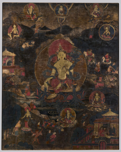 Bodhisattva wearing five-pointed crown and billowing blue sash seated atop lotus pedestal before mountainous landscape