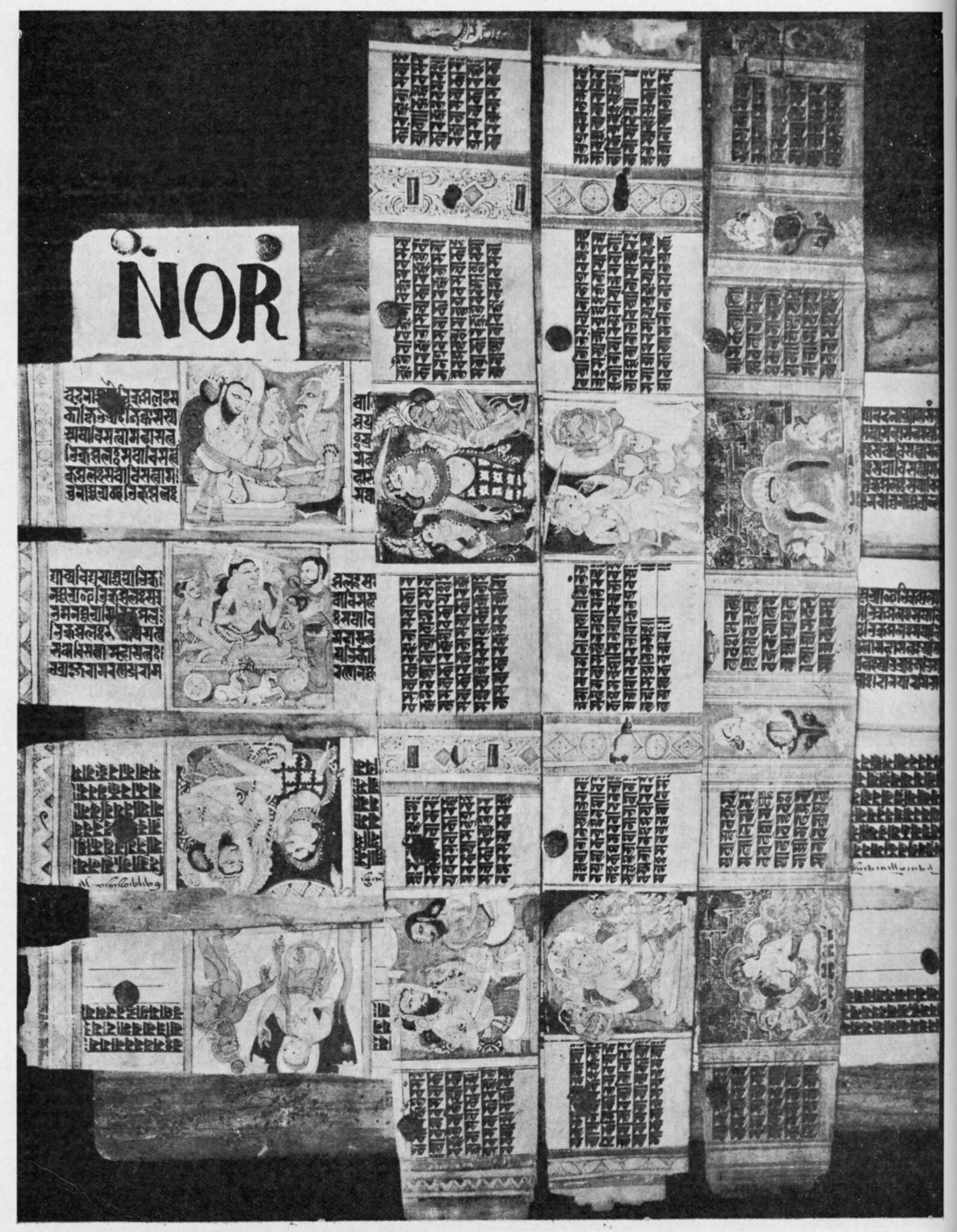 Black and white photograph of rectangular manuscript pages arranged in crosshatch pattern on wooden surface; “NOR” handprinted in upper left corner