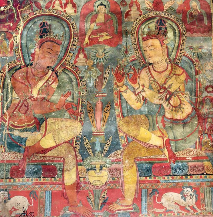 Two Bodhisattvas with legs crossed incline heads toward one another and pose hands in ritual gestures (mudras)
