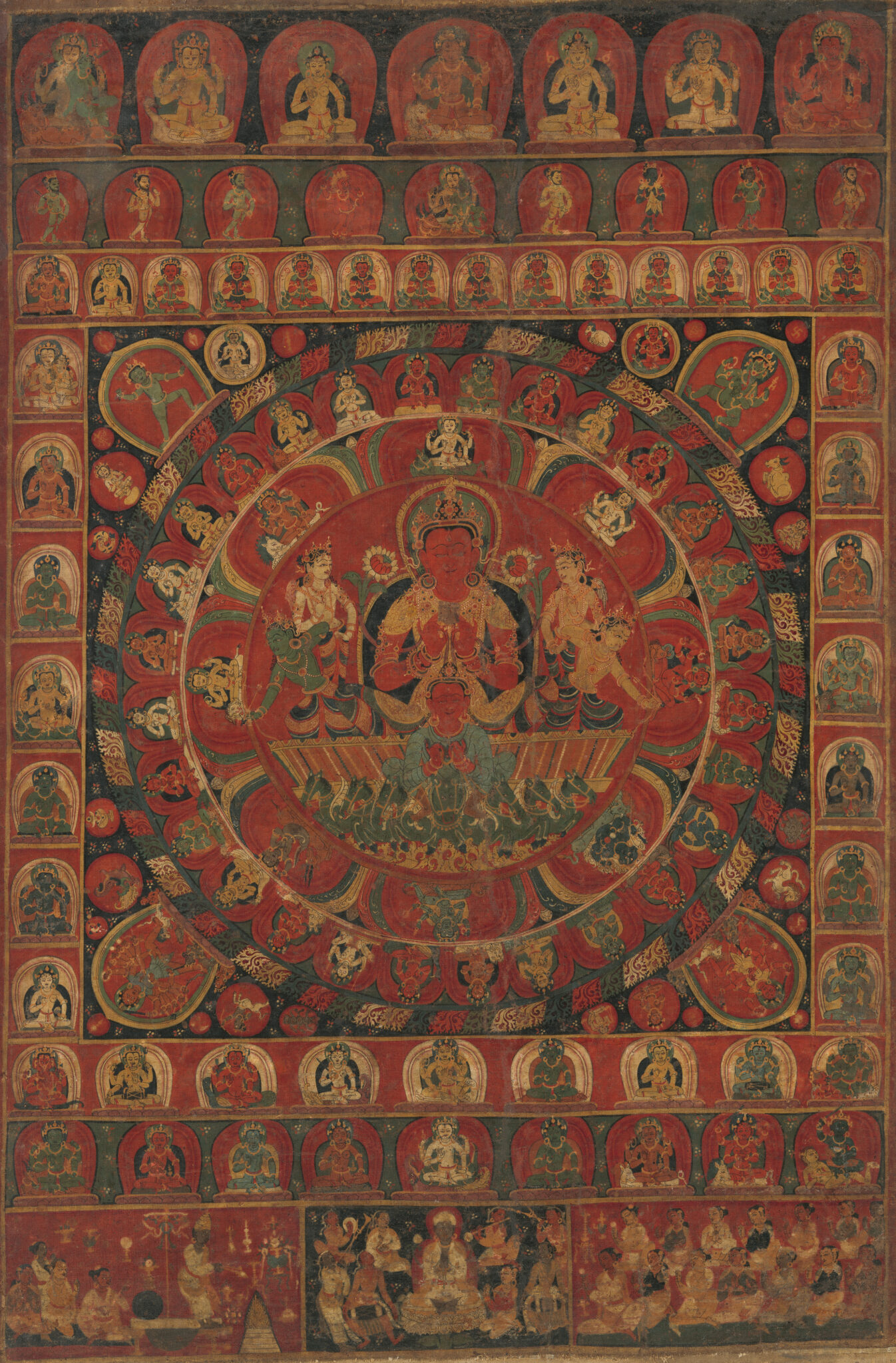Red-toned mandala featuring deity surrounded by multitude of deity portraits arranged in registers