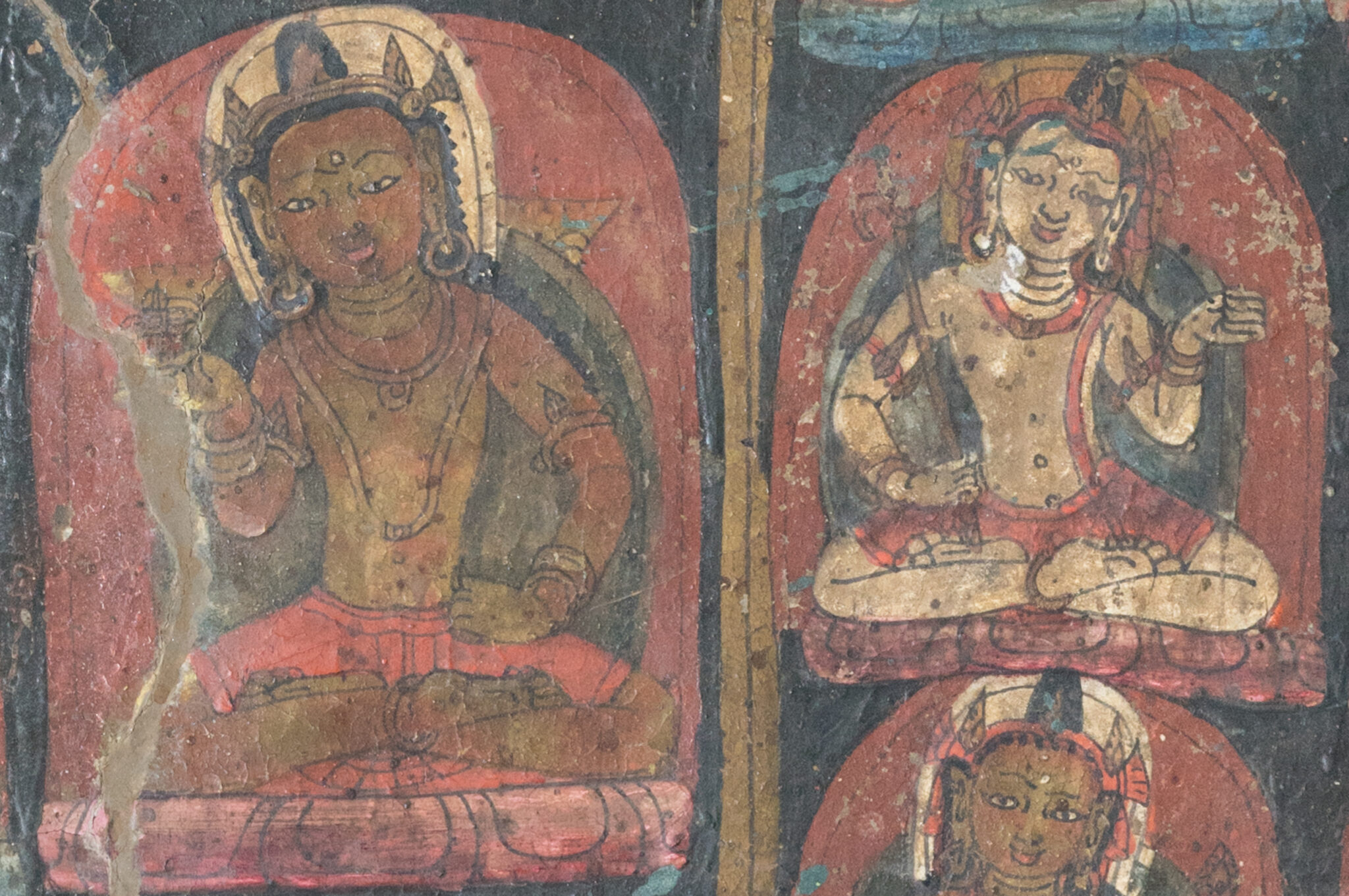 Mural detail showing two crowned deities wearing long necklaces seated before red nimbuses