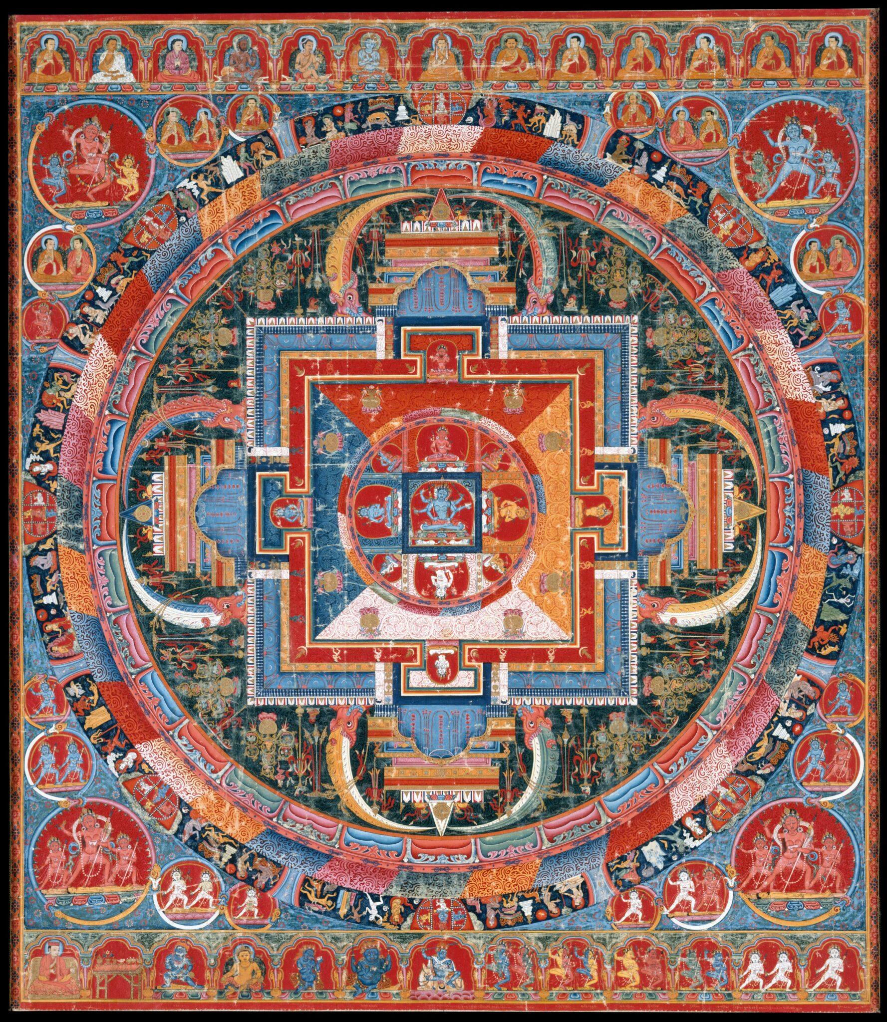 Profusely decorated, brightly colored mandala featuring portraits in roundels and in arches at top and bottom