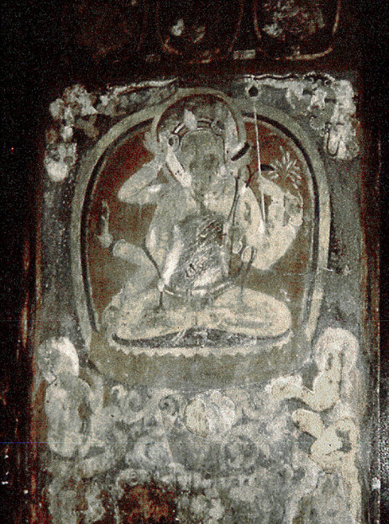 Faded wall painting in browns and grays of deity seated on ornamental pedestal flanked by attendants