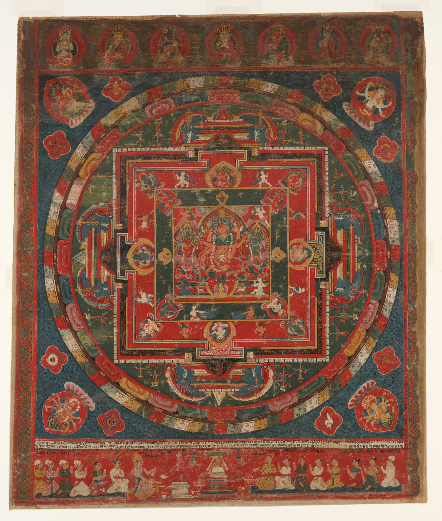 Sacred composition of concentric circles and squares featuring deity at center surrounded by multitude of figures and symbols
