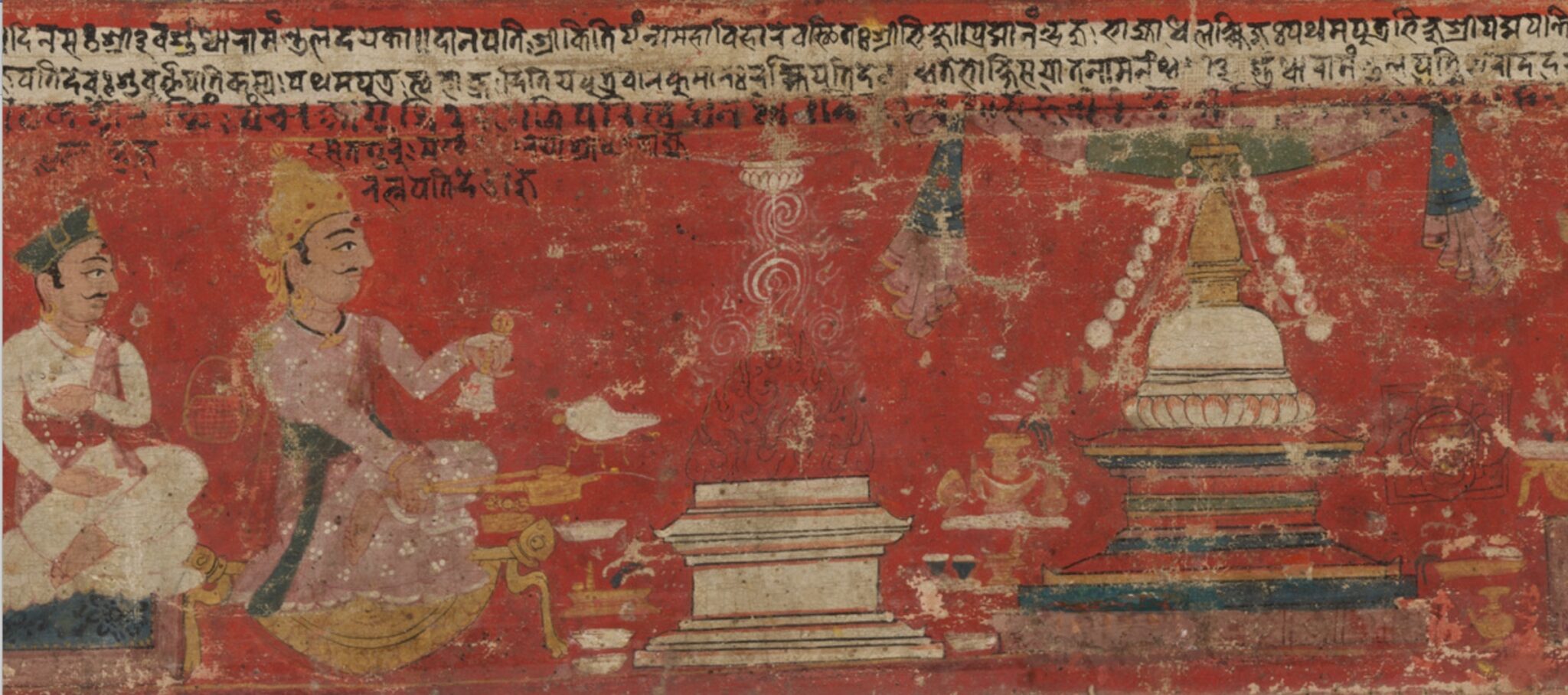Two men kneel facing altar and stupa against red background with lines of text above scene