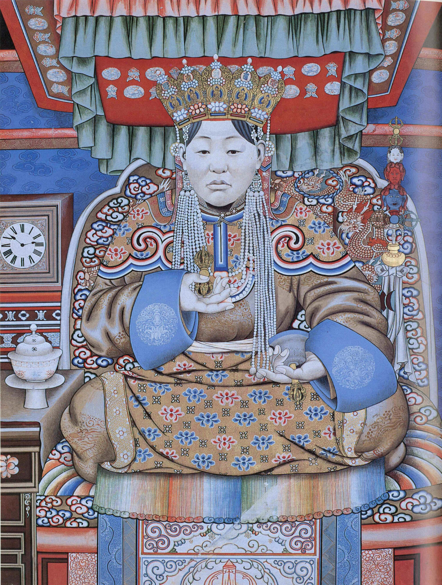 Noblewoman wearing pearl-tasseled crown, seated on canopied throne, holding vajra and bell in hands
