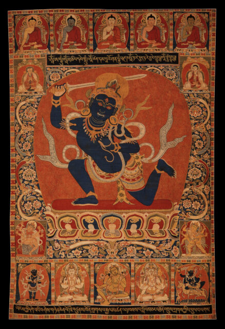 Blue-skinned deity raises sword in dynamic pose against orange nimbus; features portraits at top, bottom, and in corners