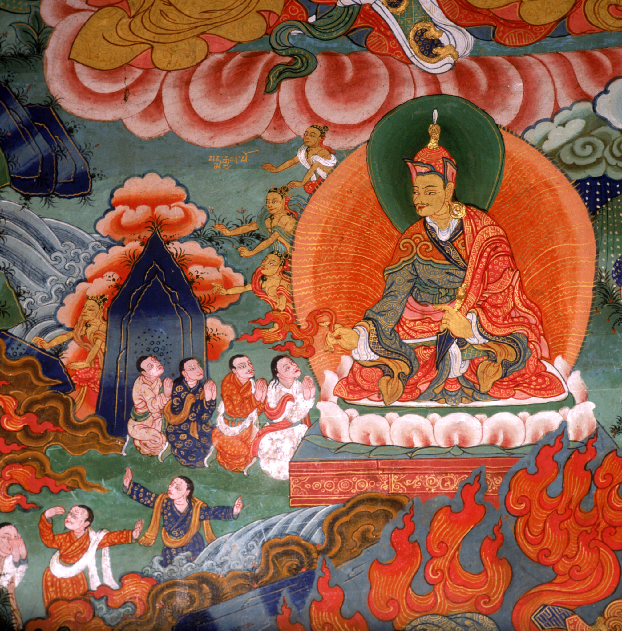 Guru gazes upon attendants at left amidst landscape featuring psychedelic flames, clouds, and water