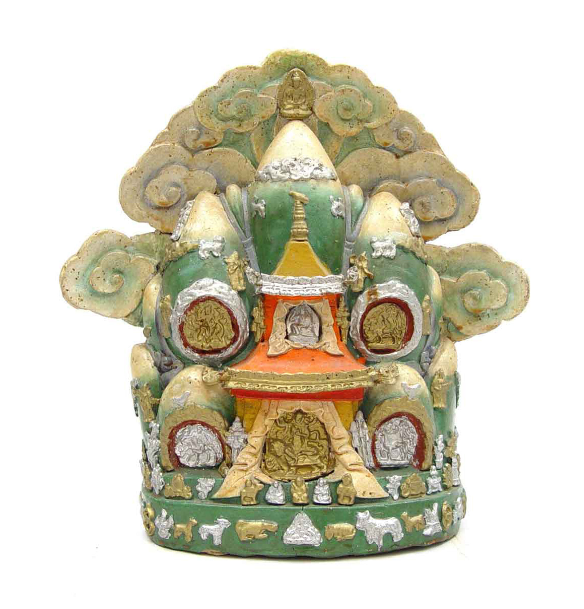 Polychrome religious sculpture in the form of two-story building surrounded by mountain peaks and stylized clouds